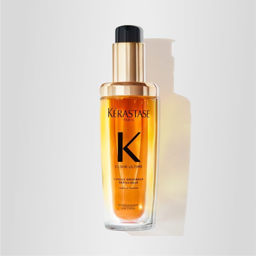 Rediscover Kérastase's iconic hair oil Elixir Ultime, now refillable. This oil is the quick fix needed by dull hair, providing hydration, smoothness, shine and protetion.